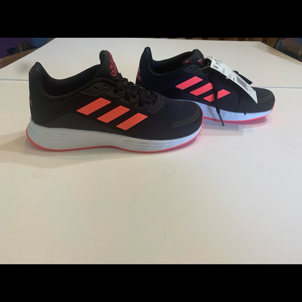 Adidas black and pink size one childrens Adidas sneakers with tag attached clean
